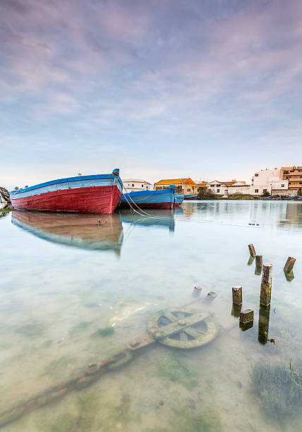istock Fishing boats moored on the River 507150666