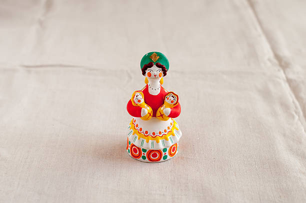 Russian Dymkovo toy on a linen background 