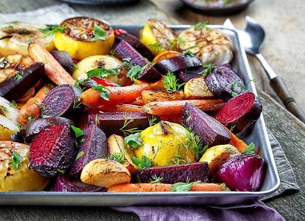 Roasted fruits and vegetables Various roasted fruits and vegetables root vegetable stock pictures, royalty-free photos & images