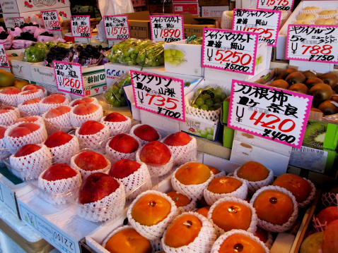 Tokyo, Japan - August 20, 2013: Fresh fruit on display at a stall at Tsukiji market, located in central Tokyo.
