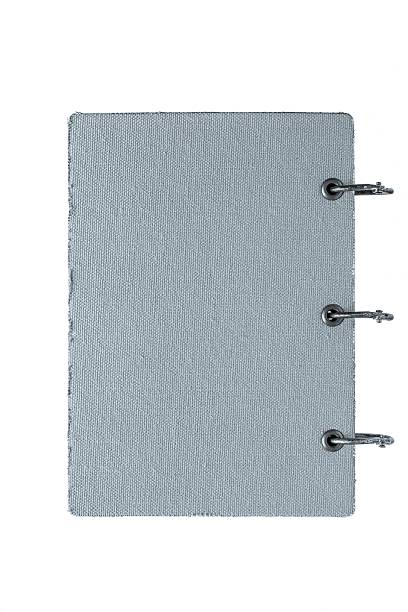istock notebook with a cover from fabric of silvery color 507158445