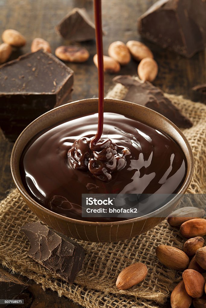 Sweet Dark Chocolate Sauce Sweet Dark Chocolate Sauce in a Bowl Black Color Stock Photo