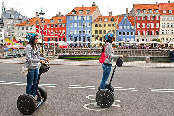 Tourists Riding Segways Stock Photo - Download Image Now - Segway,  Copenhagen, Bicycle - iStock
