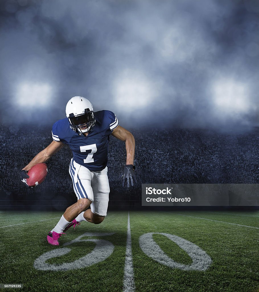 American-Football-Spieler in einem Spiel - Lizenzfrei Amerikanischer Football Stock-Foto