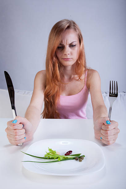 istock Thin girl and her little breakfast 507160927