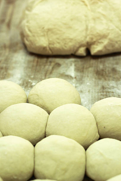 istock dough in electric mixer - dough, put a pellet. 507162649