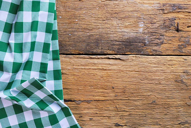 istock the background made from checkered napkin on old wooden table 507162893