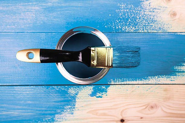 istock Painting a wooden shelf using paintbrush 507168344