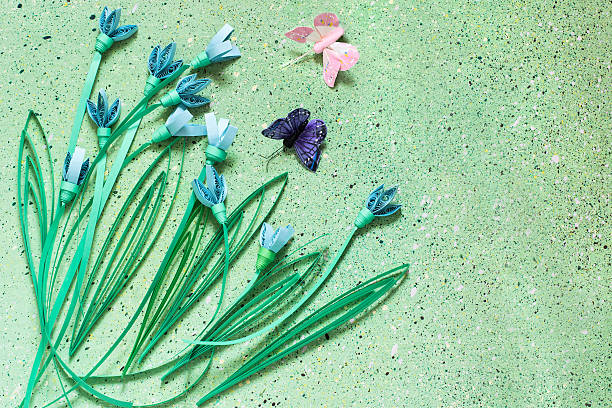 istock Festive background with snowdrops in the technique of quilling 507168804