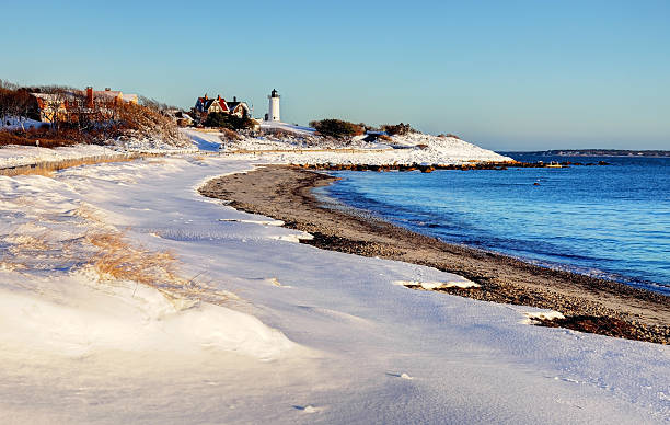 istock Snow Coverd Dunes and the Nobska Lighthouse on Cape Cod 507171040
