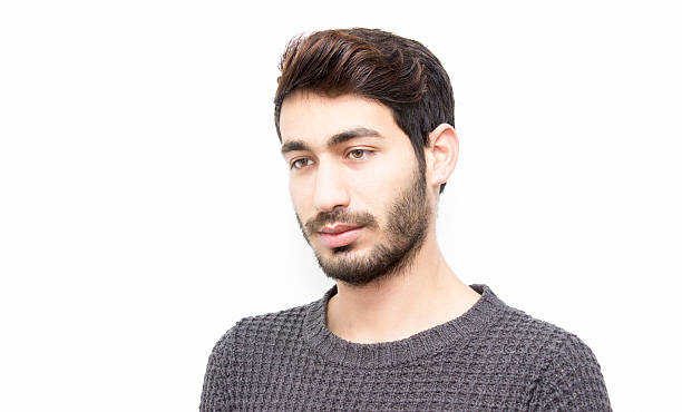 istock Portrait of young man looking away with blank expression 507171302
