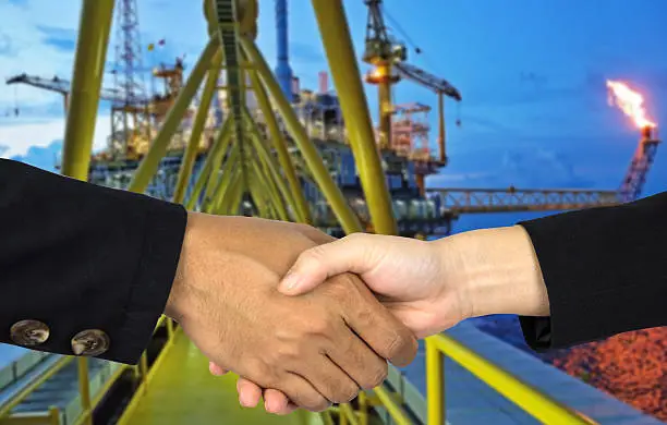rig background with man and woman shakehands