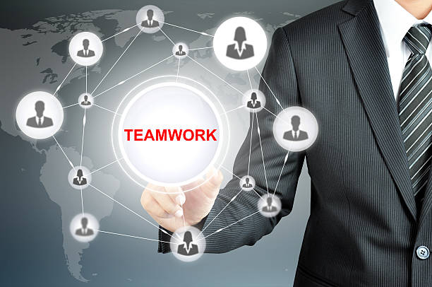 istock Businessman hand pointing on TEAMWORK sign on virtual screen 507177714