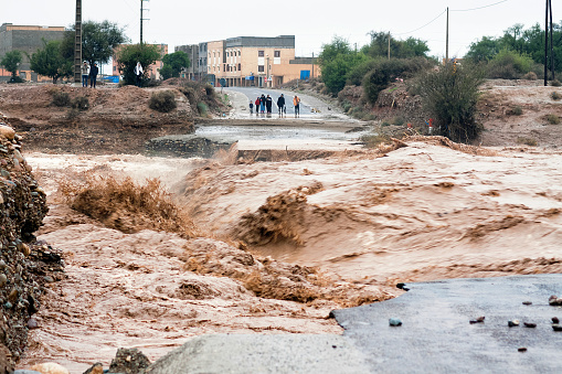 Sidi Ouaaziz, Morocco - November 28: Flooding in region Souss Massa Draa. A powerful stream of water destroyed bridge in place Sidi Ouaaziz