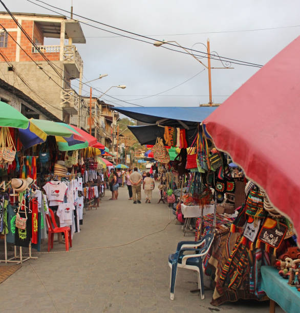 Montañita, Ecuador Market Montañita, Ecuador - November 3, 2014: People walking the streets of the Montanita Mini Market, a popular tourist shopping location. montanita ecuador stock pictures, royalty-free photos & images