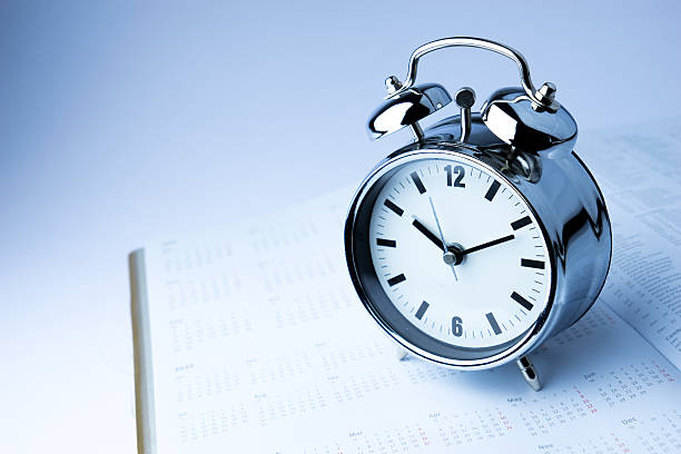 istock Metal Alarm clock, work & wake up time, white background 507185831