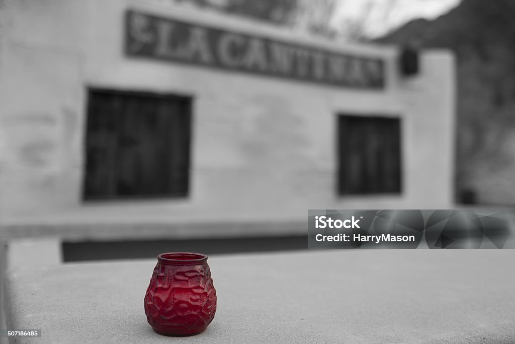 THE CELLAR Red glass filled with sinful water Abstract Stock Photo