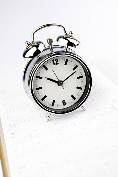 istock Metal Alarm clock, work & wake up time, white background 507186589