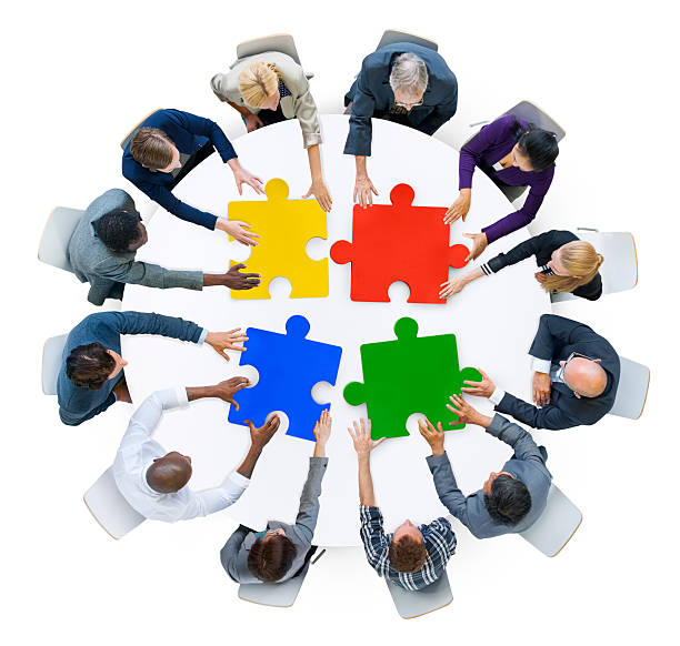 ビジネスの人々、ジグゾーパズル、チームワークの概念 - jigsaw puzzle puzzle community meeting ストックフォトと画像