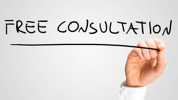 istock Man writing the words - Free Consultation 507187365