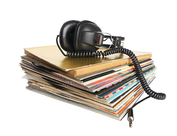 istock Vintage headphones on the stack of vinyl records 507188255