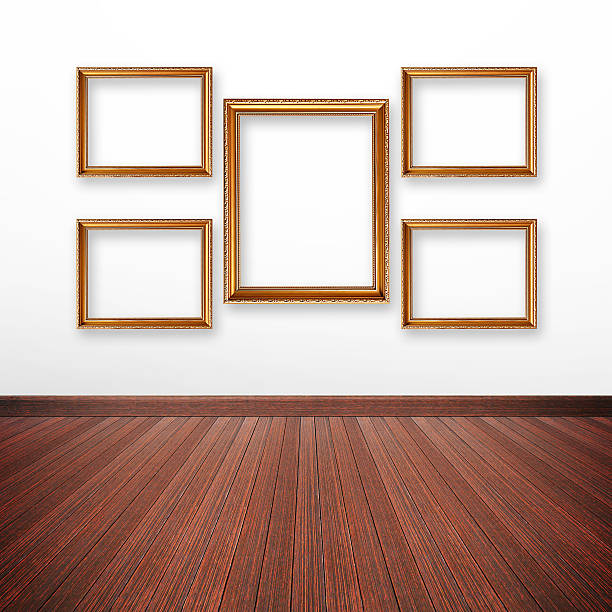 istock Golden picture frames on the wall inside the room 507188261