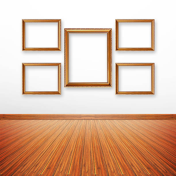 istock Golden picture frames on the wall inside the room 507188263