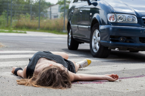 Horizontal view of car hit young woman