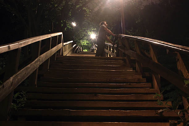 istock Alone in a Stairs night / Alone in a Staircase 507190953