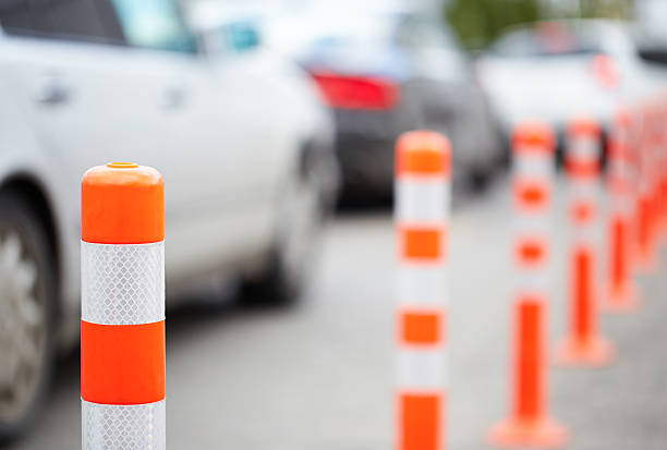 istock Orange bollard on the road. Traffic jam. 507191235
