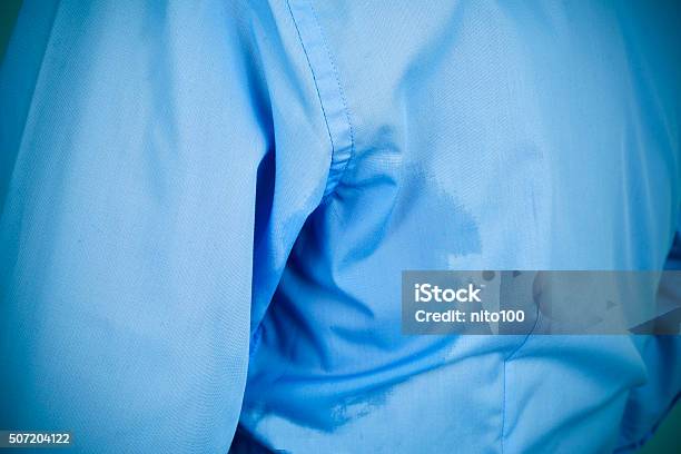 Man With An Underarm Sweat Stain Stock Photo - Download Image Now - Sweat, Armpit, Sweat Stain