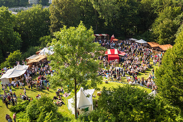 istock Celebration with tents and people 507205886