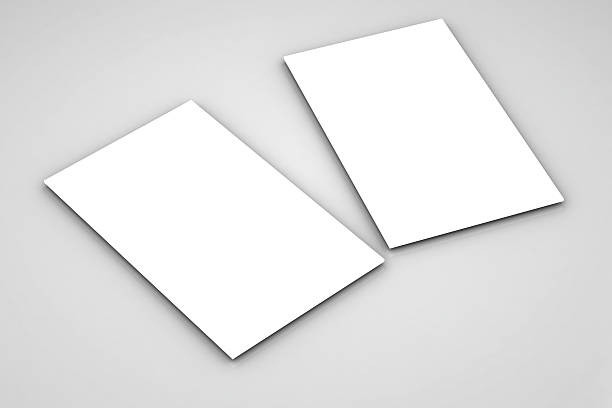 istock close up of stack of papers on white background 507208613