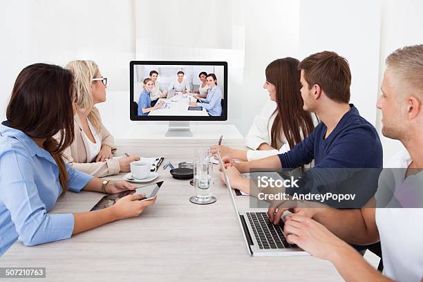 Business Team Attending Video Conference Stock Photo - Download Image Now - Video Conference, Conference Call, Web Conference