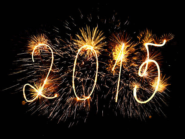 istock Happy New Year 2015 sparklers firework 507211439