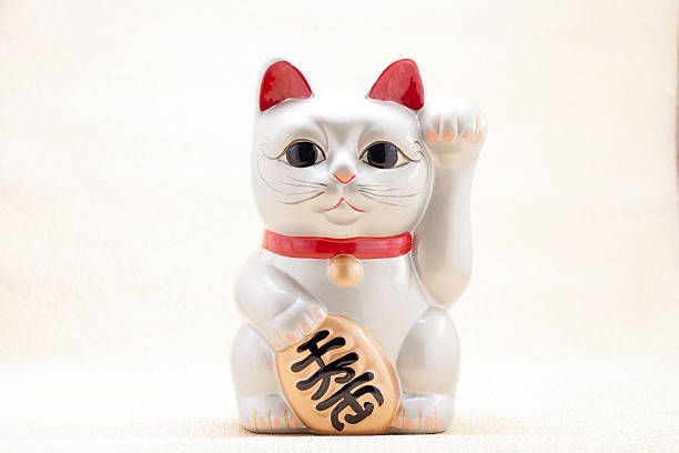 istock Japanese beckoning cat also known as maneki neko 507211631