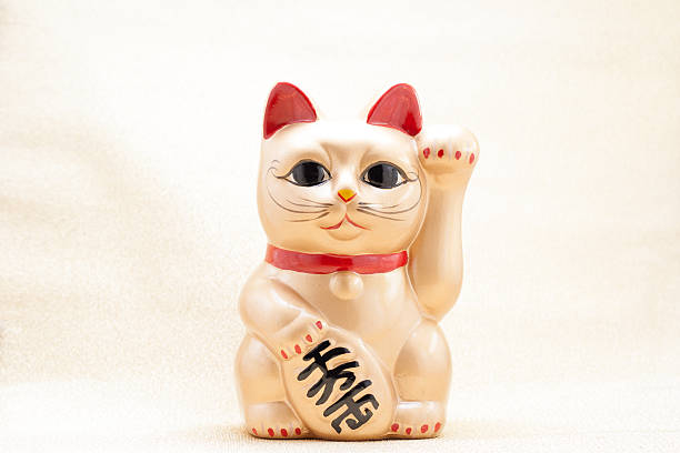 istock Japanese beckoning cat also known as maneki neko 507211633