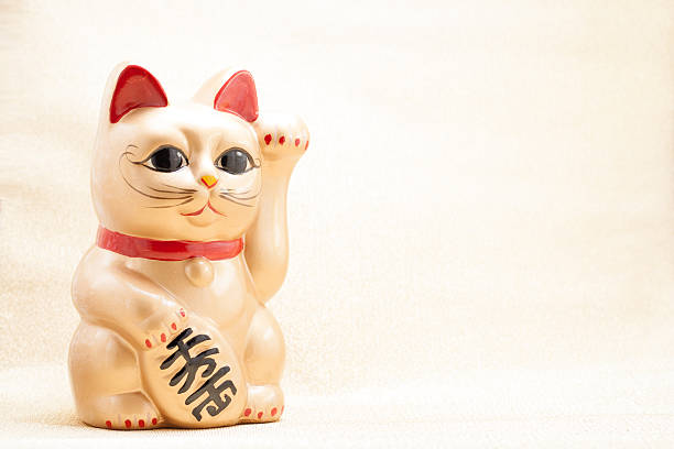 istock Japanese beckoning cat also known as maneki neko 507211635