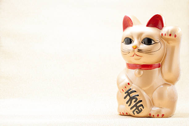 istock Japanese beckoning cat also known as maneki neko 507211637