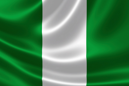 Close-up of the flag of Nigeria on satin texture.