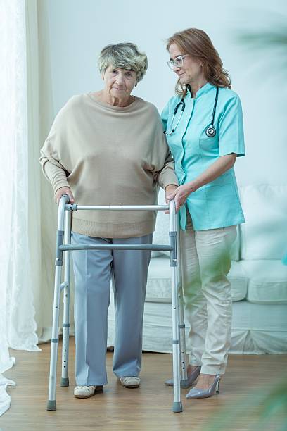 istock Care assistant and old lady 507212318