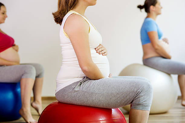 istock Pregnant women exercising 507212375