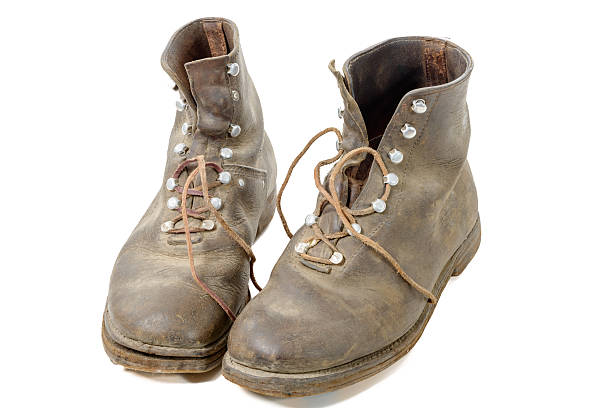 istock pair of old WW2 boots military isolated on white background 507213186