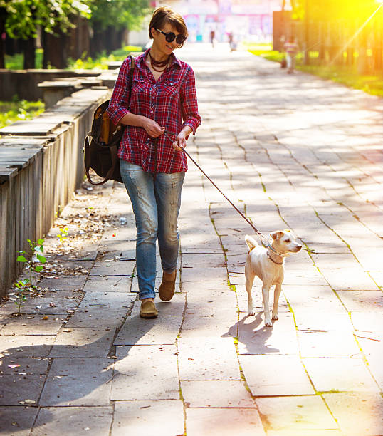 istock woman and dog 507213763