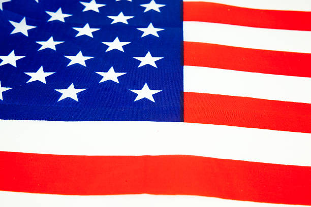 istock American dollars and flag 507214198