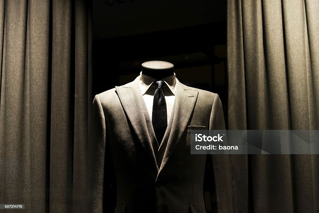 business suit store business suit store window display. Haute Couture Stock Photo