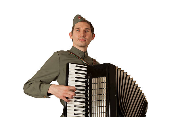 istock Soviet soldier playing the accordion over white background 507215430