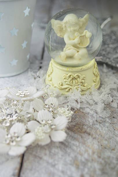 istock Christmas angel statuette on silver background 507218344
