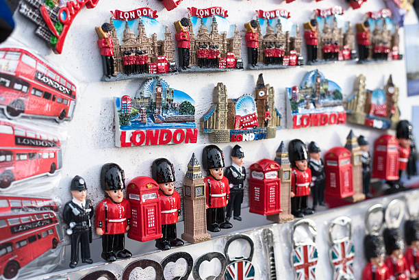 British Souvenirs LONDON, UK, JANUARY 23, 2016: Typical London street stall selling tourist souvenirs of classic British cuture on January 23, 2016. London Memorabilia stock pictures, royalty-free photos & images