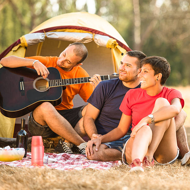 istock Friends storytelling at camping 507236435
